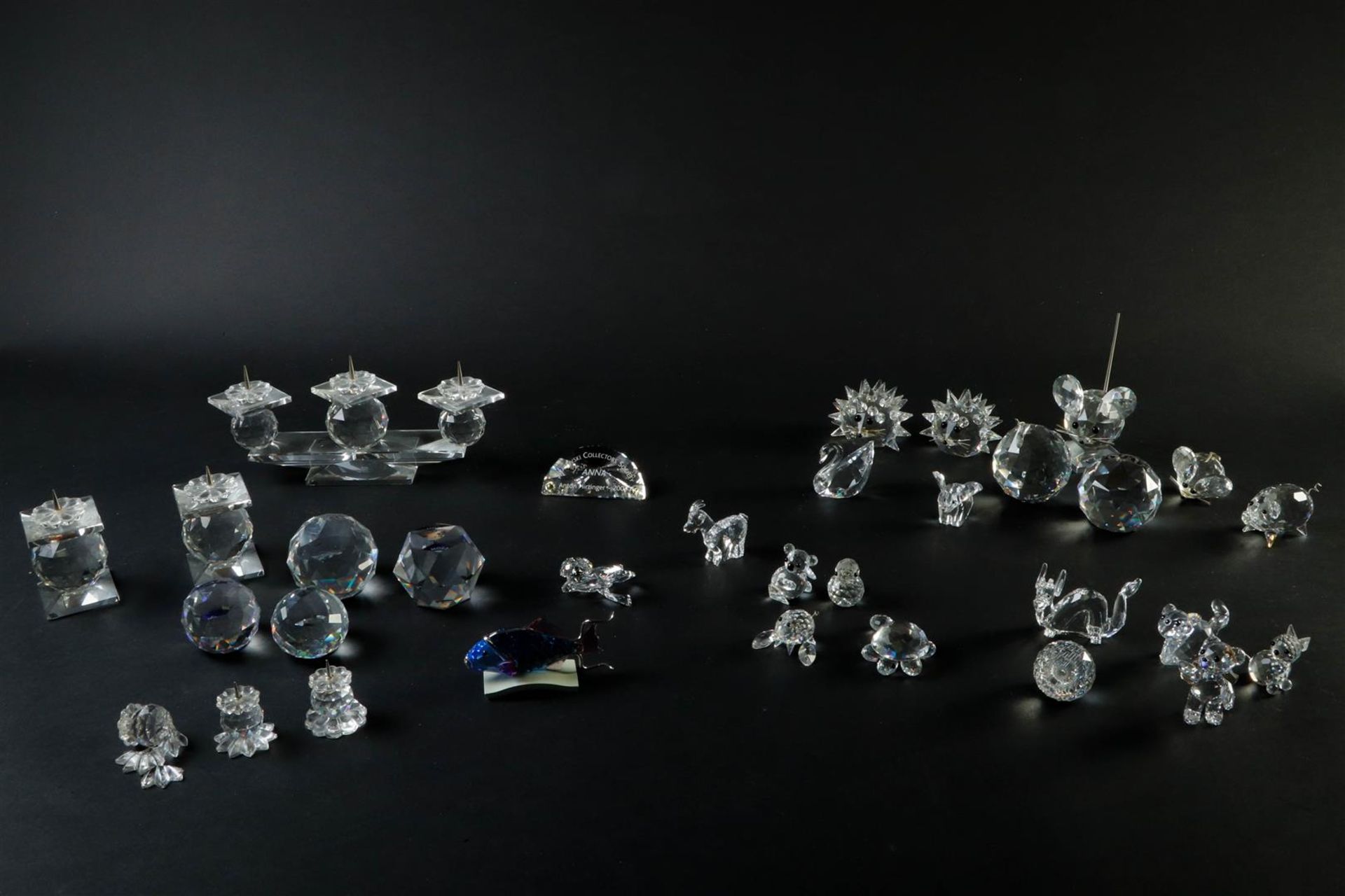 Swarovski, lot with various figures and candlesticks.