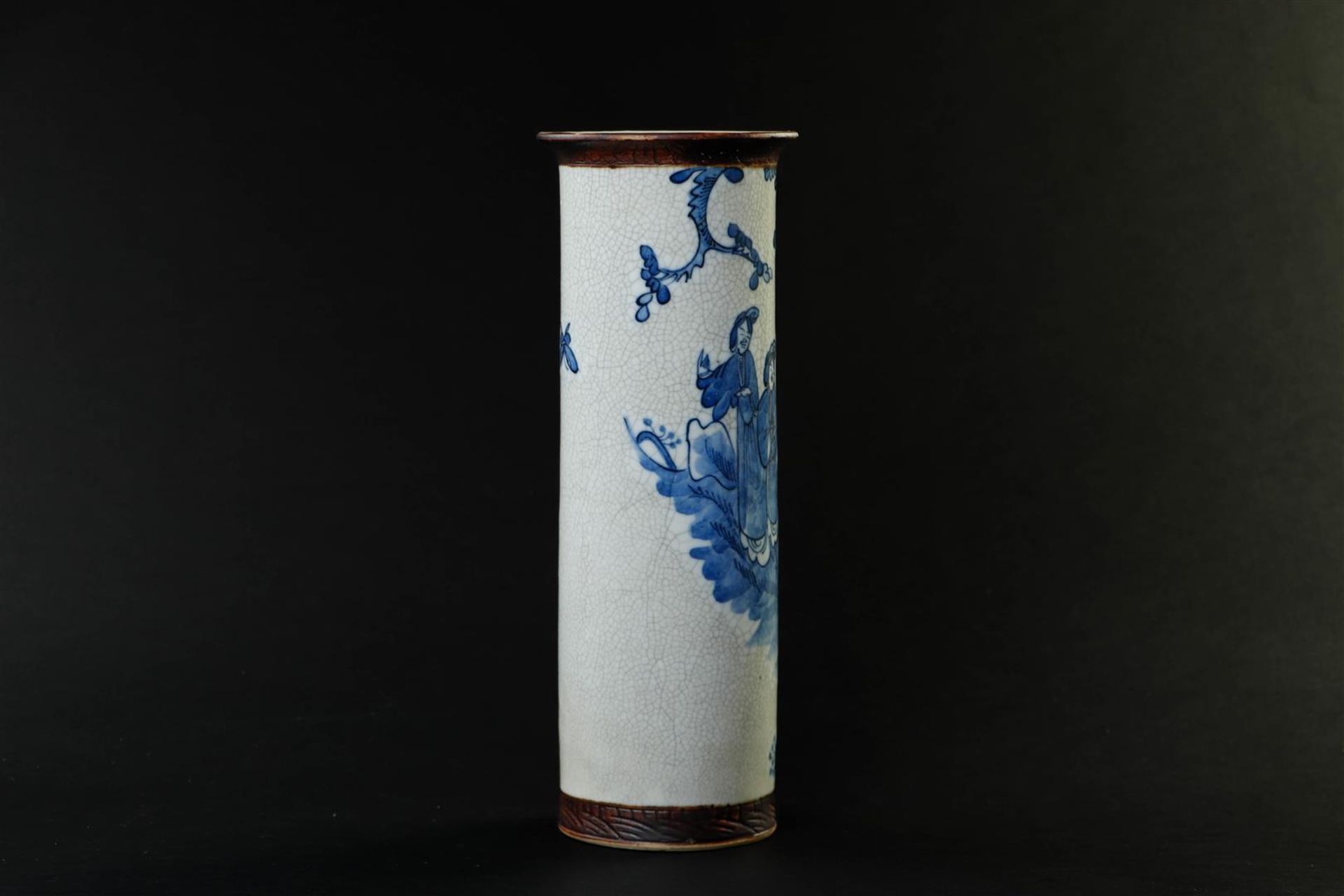 A Nanking cylinder vase decorated with various figures.
H. 35 cm. - Image 2 of 5