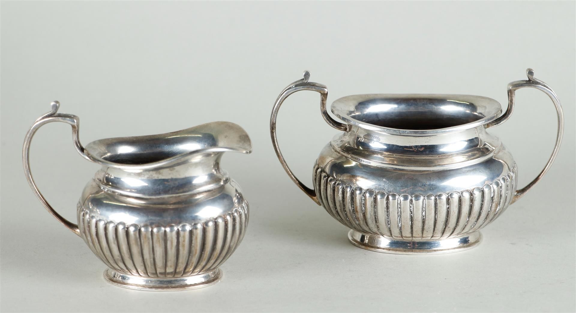 A silver coffee and tea set, consisting of a coffee pot, a teapot, a cream jug and a sugar bowl. Mar - Image 4 of 13