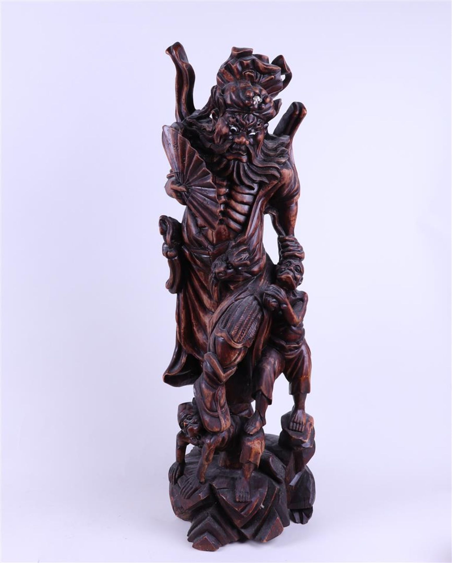 A large richly carved statue, circa 1900.
H. 68 cm.