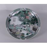 A large famile verte dish decorated with various figures and texts, marked Kangxi. China, 20th centu