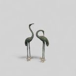 A lot consisting of two bronze Asian cranes.
H.: 147 cm.