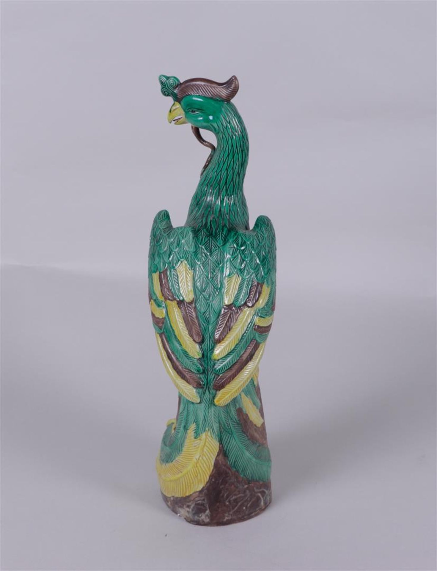 A sancai figure of a phoenix, marked on the bottom. China, 20th century.
H. 40 cm. - Image 3 of 4