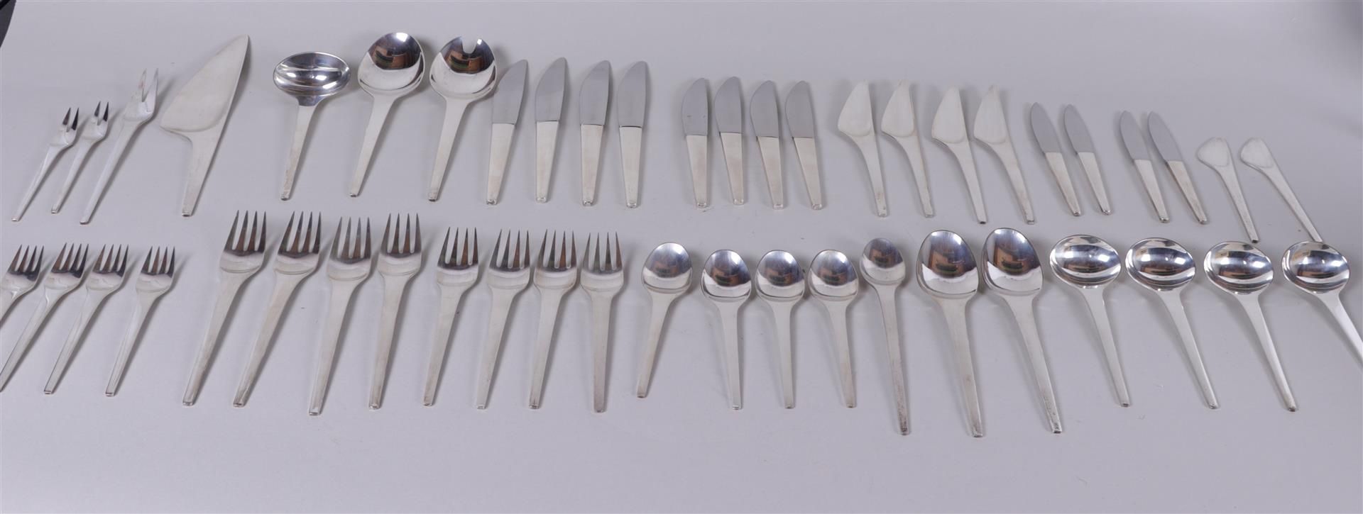 A sterling silver 48 piece Georg Jensen Caravel cutlery consisting of four serving spoons, vegetable