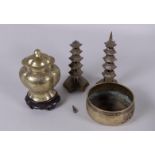 Lot of various copper objects consisting of a lidded vases, a bowl and two Wenchan towers. China, 19