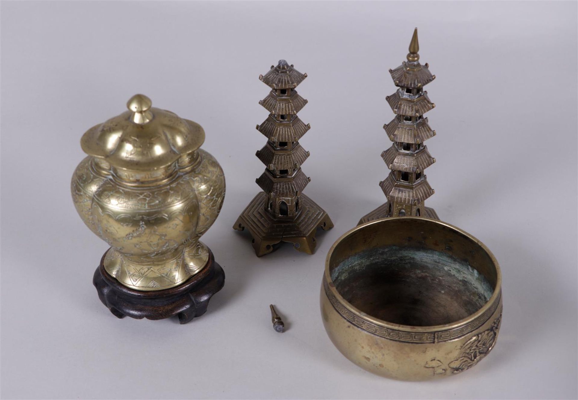 Lot of various copper objects consisting of a lidded vases, a bowl and two Wenchan towers. China, 19
