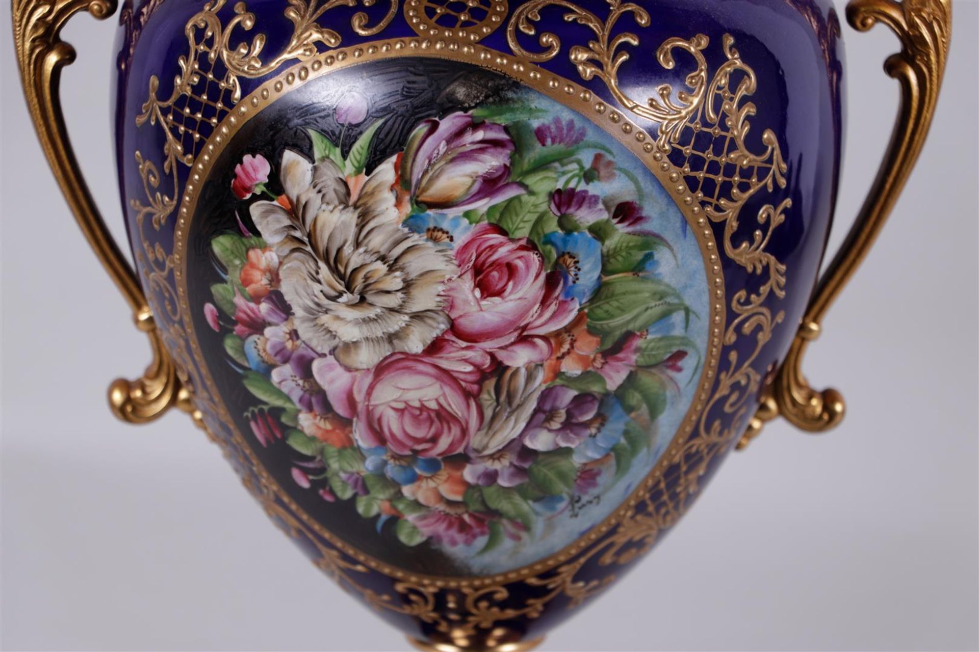 A Sevres-style lidded vase with brass frame.
H. 62 cm. - Image 2 of 3