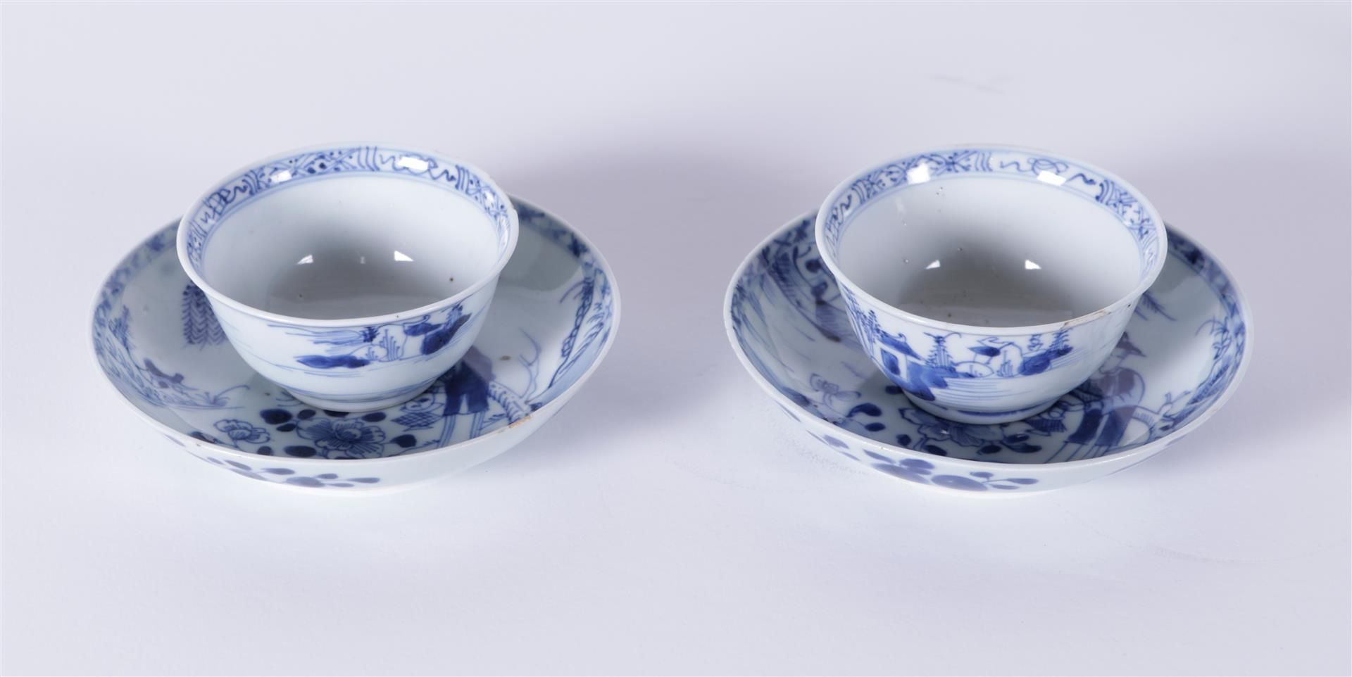 Two porcelain cups and saucers with a landscape decot with figures. China, Kangxi/Yongzheng ca 1722.