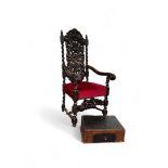 A large carved, Neo Renaissance throne chair, upholstered in red velvet. In addition, an oven with c