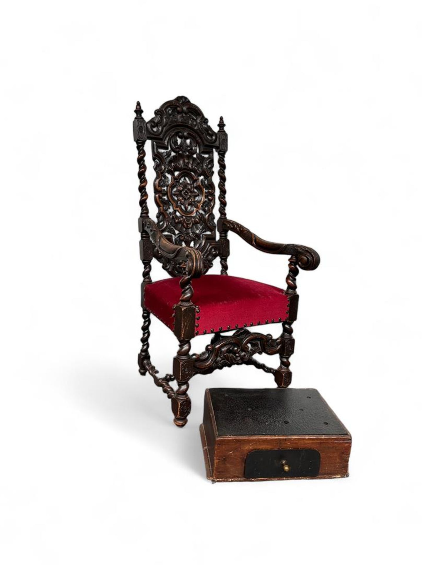 A large carved, Neo Renaissance throne chair, upholstered in red velvet. In addition, an oven with c