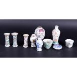 A lot of miscellaneous Chinese porcelain including a tea caddy, and various vases, 18th century.