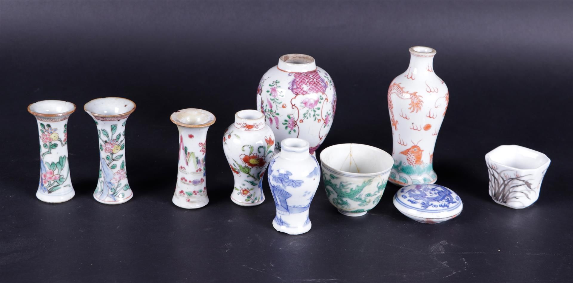 A lot of miscellaneous Chinese porcelain including a tea caddy, and various vases, 18th century.