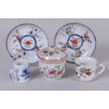 A lot of various porcelain Famille Rose objects including a sugar bowl, (2) cups and (2) saucers.