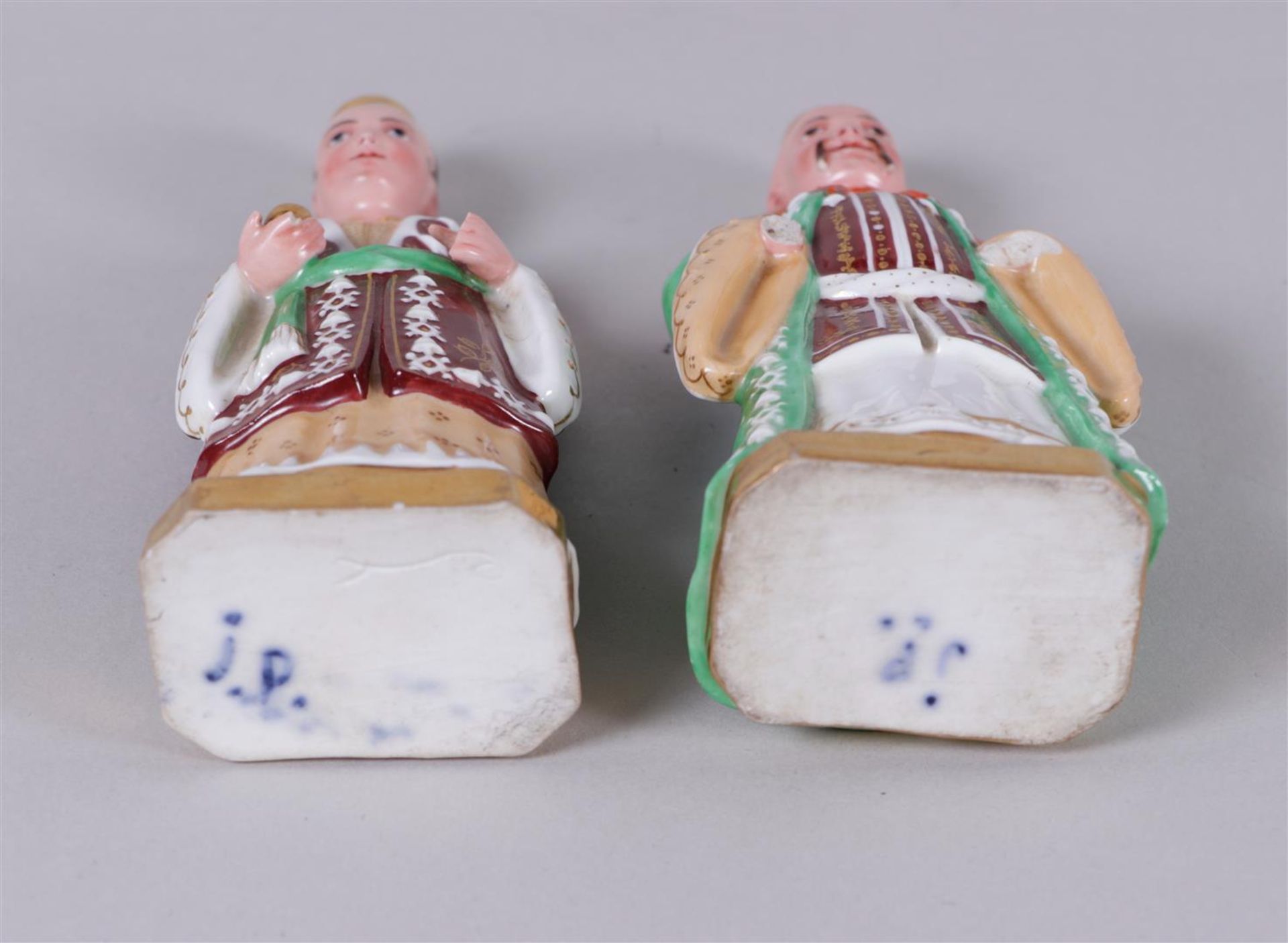 Two porcelain figures in costume, marked JP. Jacob Petit, 19th century.
H. 18 cm. - Image 2 of 3