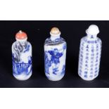 A lot of three porcelain snuff bottles with various decors, marked on the bottom. China, 19th centur