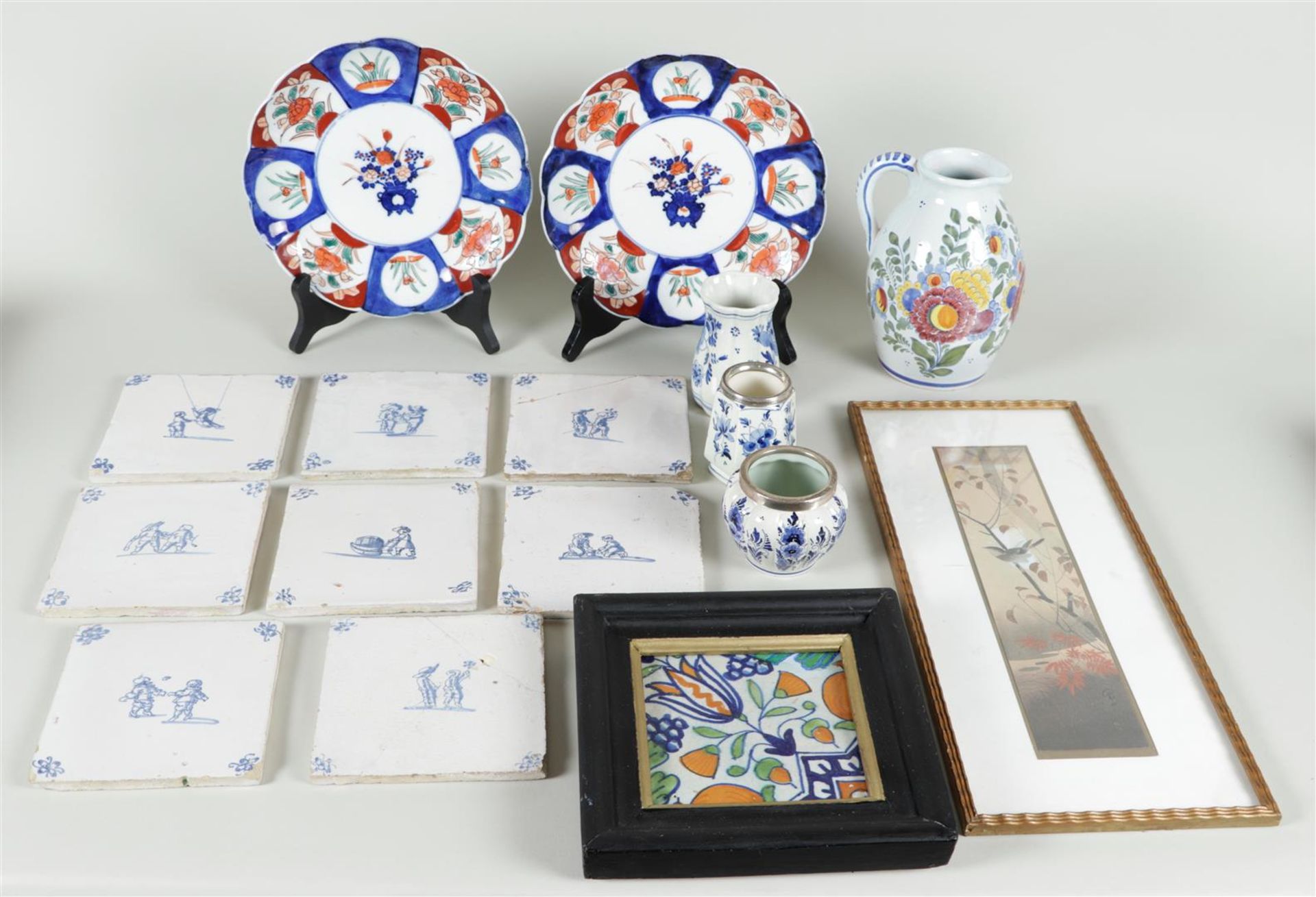 A lot consisting of, among other things, various Delft blue tiles, and one polychrome square tile, 1