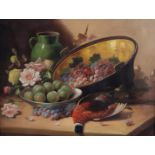 Beklgische School, ca, 1930, A still life with game, grapes and roses near a green jug, unclearly si