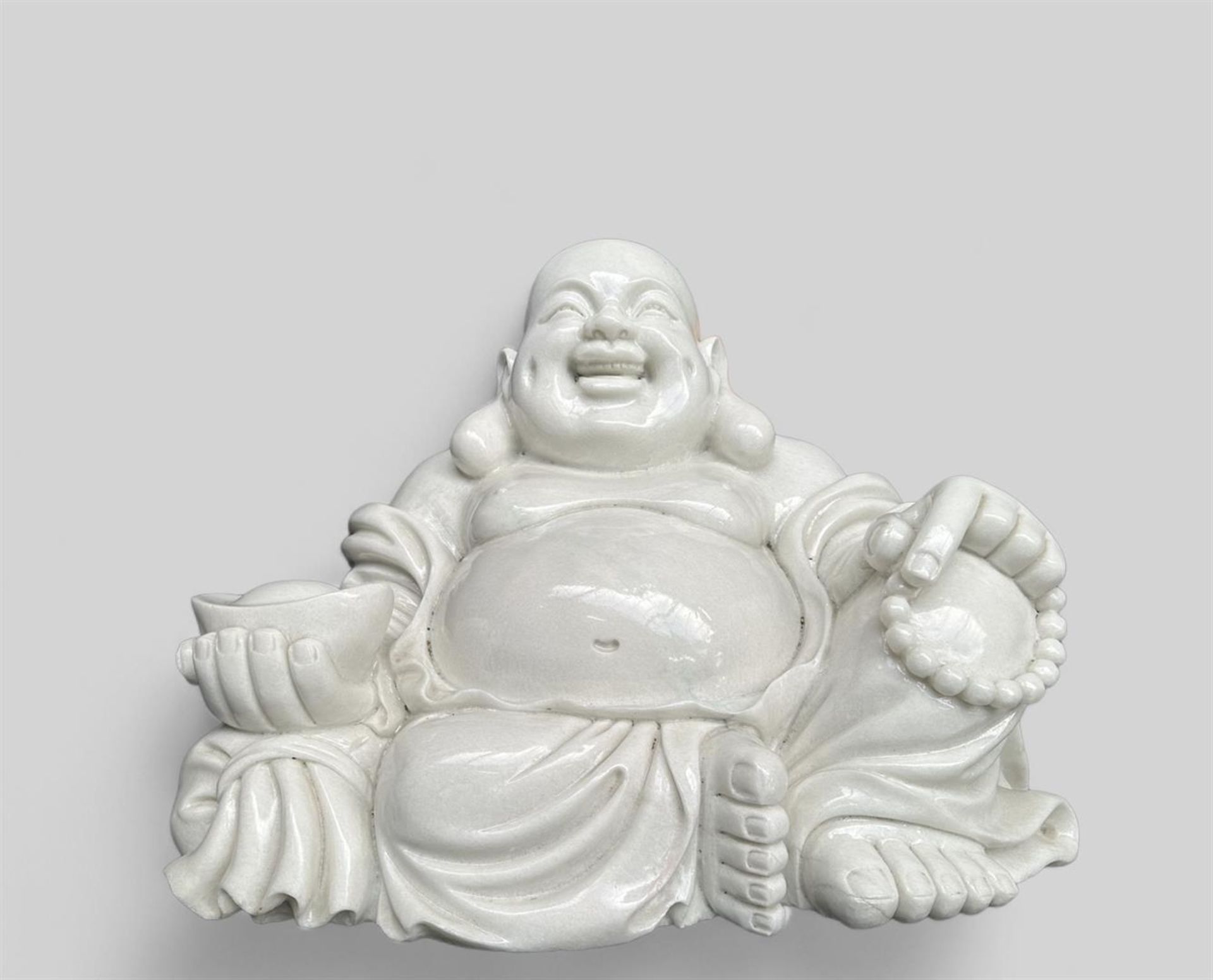 Single-capital white marble sitting Buddha, China, 20th century. Weight approx. 150 kg.
H.: 70 cm.