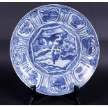 A porcelain plate with 8 borders on the outside, 2x geese on the shore and a flying goose in the cen