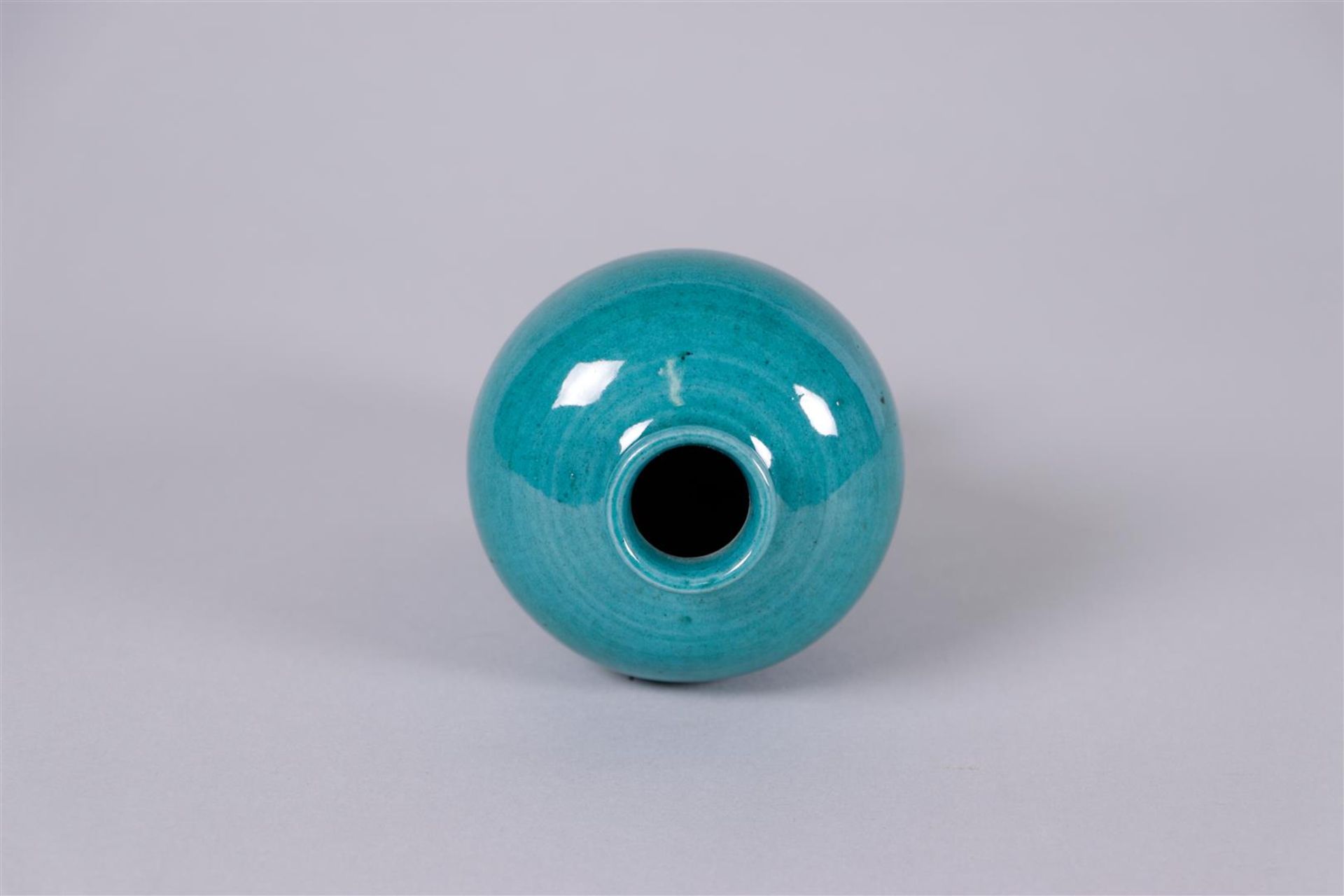 A green glazed meiping vase. China, 20th century.
H. 14 cm. - Image 2 of 3