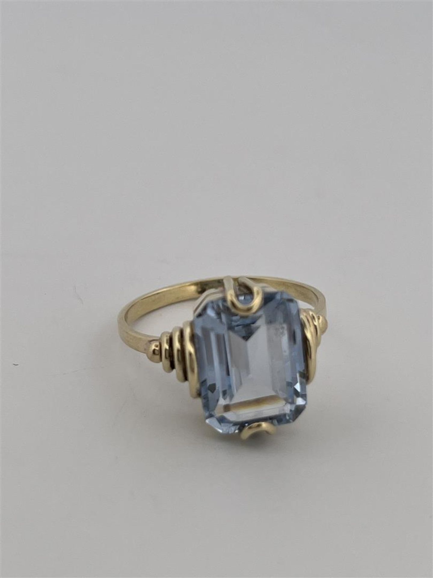 14kt yellow gold ring set with aquamarine.
The aquamarine isemerald cut measures approx. 11.8 x 8.9  - Image 4 of 11