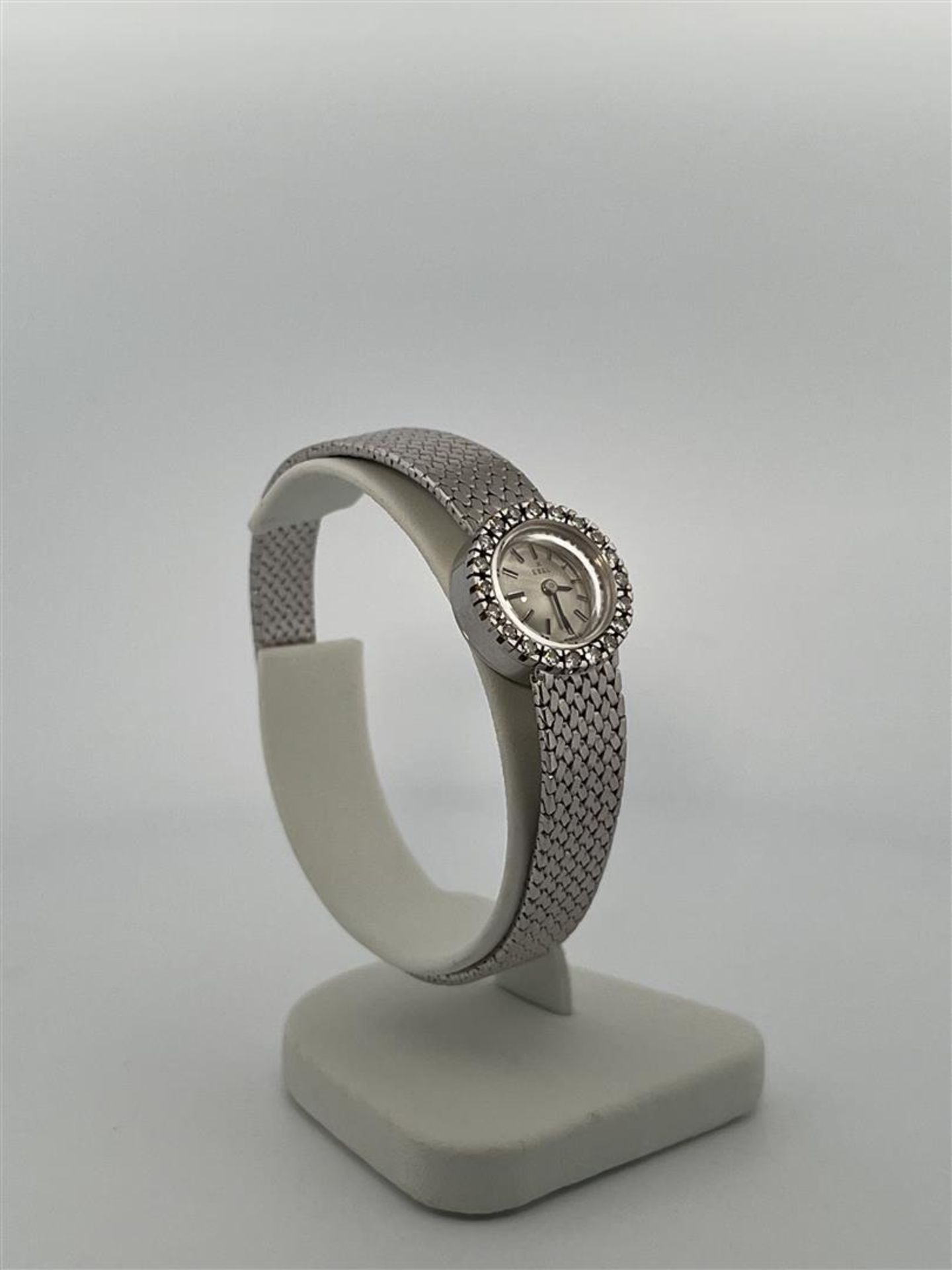 18kt white gold Ebel cocktail ladies watch set with diamonds. 
This watch is beautifully finished wi