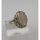 14kt yellow gold ring with openwork edge and moonstone.
The ring is set with an oval cut cabochon mo