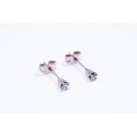 9kt white gold solitaire stud earrings set with diamonds. Of which everyone's 0.08ct. With a total o