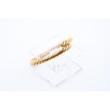 18kt yellow gold solid twisted slave bracelet / esclave / bangle from Indonesia.
The bracelet is sol