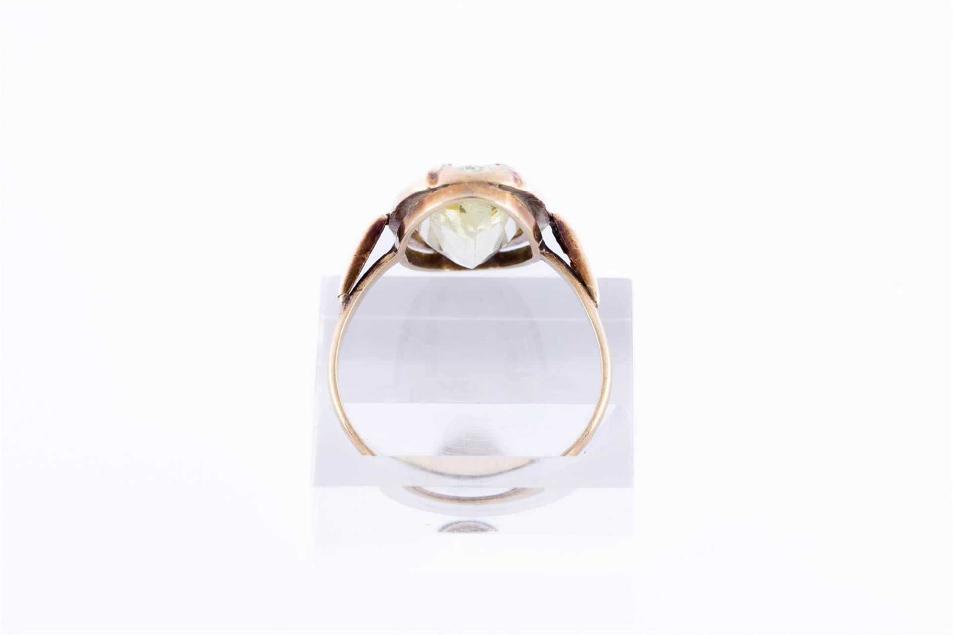 18kt Yellow gold ring set with one oval cut imitation peridot. 
Stone dimensions: 17.5 mm x 9.2 mm
R - Image 3 of 3
