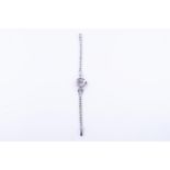 14kt white gold Precimax Incabloc ladies watch set with diamonds.
The watch has a beautiful white go