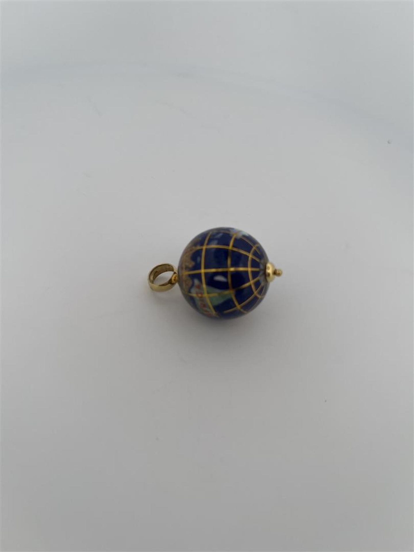 18kt yellow gold globe pendant inlaid with enamel and gemstones.
The globe also has a name for each  - Image 2 of 4