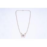 14kt Yellow gold chain (anchor link) with beautiful butterfly. The butterfly is set with 1 oval cut 