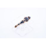 18kt Yellow gold rosette bracelet set with 31 blue sapphires. The bracelet has a sturdy and extra se