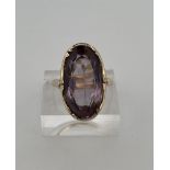 14kt yellow gold ring set with amethyst. 
Amethyst dimensions: approx. 20.2 mm x 9.8 mm.
Weight of r