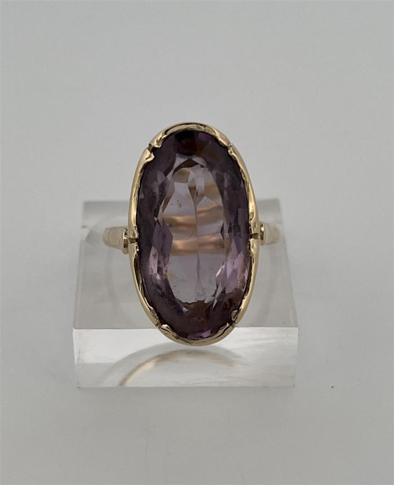 14kt yellow gold ring set with amethyst. 
Amethyst dimensions: approx. 20.2 mm x 9.8 mm.
Weight of r