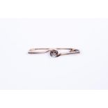 14kt yellow gold pin/brooch set with diamonds.
The brooch/pin is set with 1 rose cut diamond of 0.15