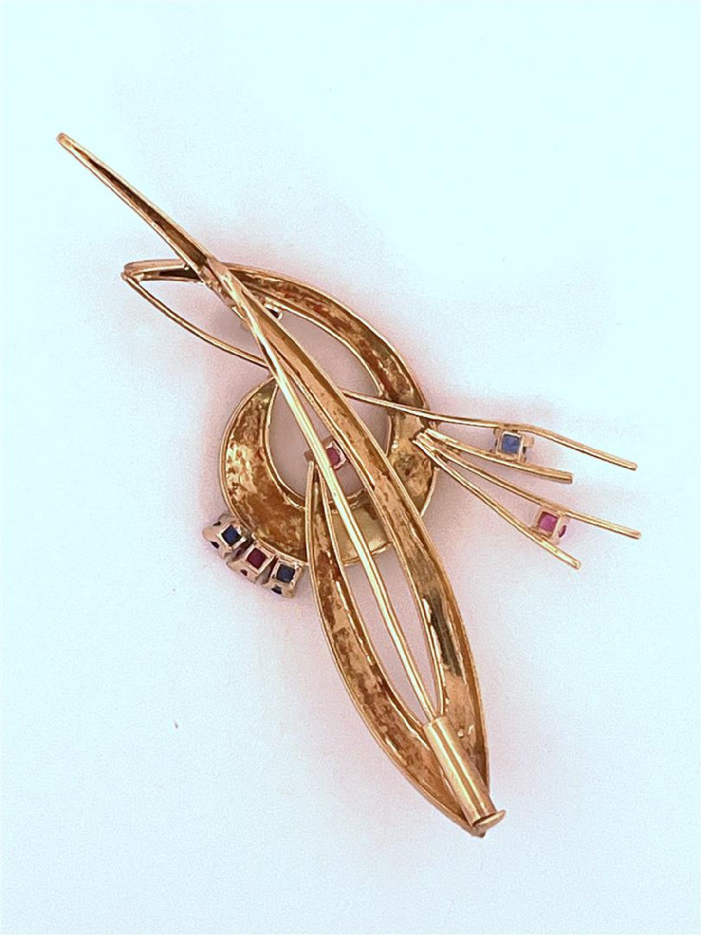 14kt bicolor gold brooch set with syn. ruby and syn. blue spinel.
The brooch is made in 14kt yellow  - Image 3 of 3