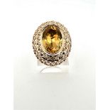 14kt yellow gold statement cocktail ring with citrine. 
The ring has a beautiful openwork double edg