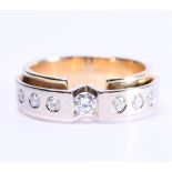 14 kt bicolor gold shoulder ring (solid) set with 7 brilliant cut diamonds, 1 of which is 0.15 ct. a