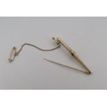 14kt yellow gold tie pin set with diamonds.
Beautiful tie pin with extra safety chain and pin, the t