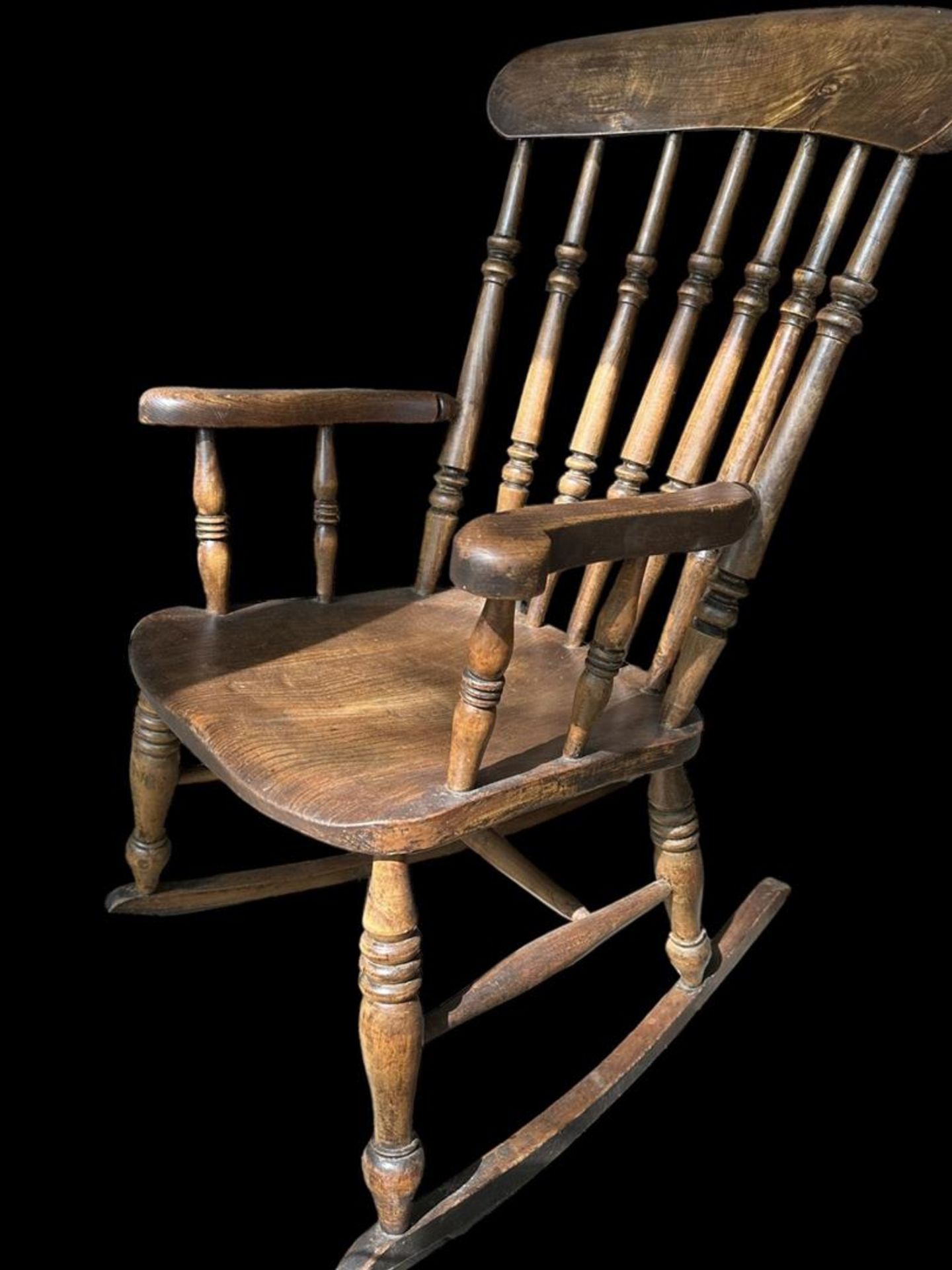 An oak rocking chair, early 20th century.