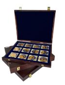 A collection of 36 ECU coins, contained in 3 boxes.