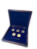 A collection of 18 gilded coins 'Long live our Royal House'. In box.