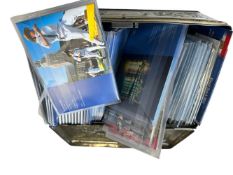 A tin of folder sets.