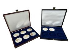 A collection of eight new currency tokens.