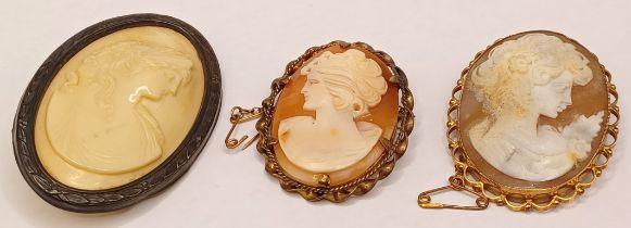 THREE CAMEO BROOCHES - A 9CT, ROLLED GOLD AND SILVER LARGEST 6CM X 4CM