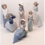 A LLADRO GIRL AND 5 NAO FIGURINES