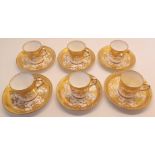 6 COFFEE CANS AND SAUCERS IN GOLD PATTERN
