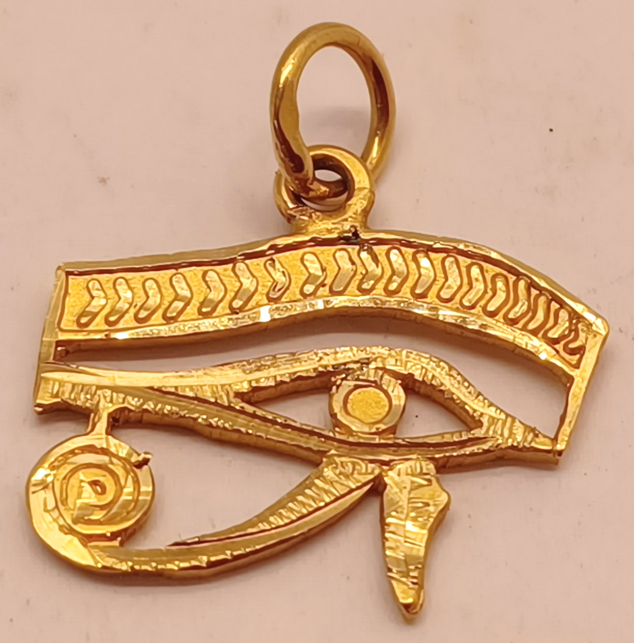 EGYPTIAN GOLD EYE OF HORUS PENDANT UNMARKED. TESTED AS GOLD. 1.6g VENDOR BROUGHT AS 18CT